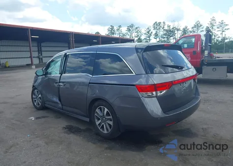 2015 Honda Odyssey Touring/Touring Elite z USA, uszkodzony, nr VIN 5FNRL5H92FB032487